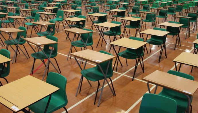 Exam hall with tables and chairs. Original public domain image from Flickr